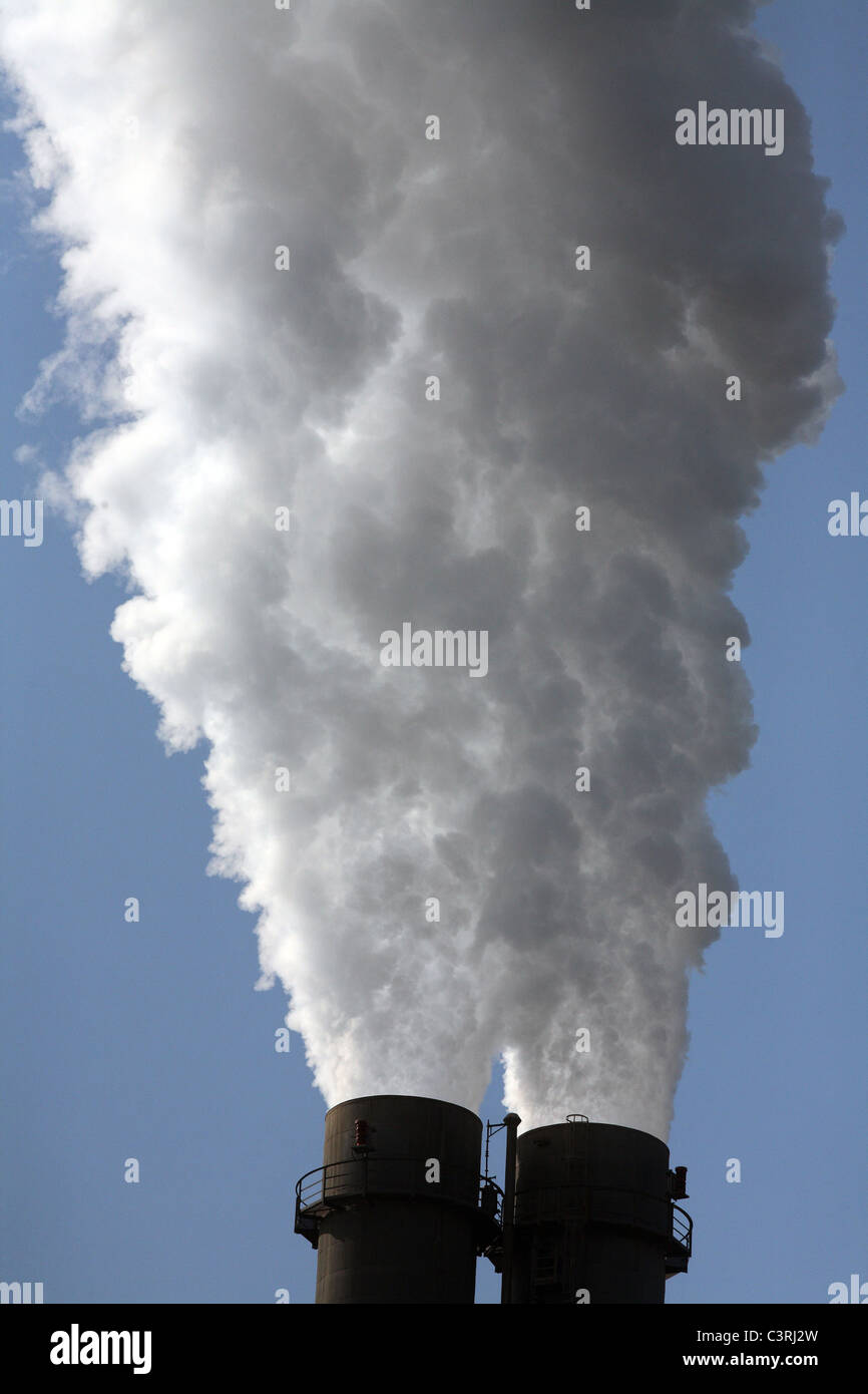 Smoking chimneys of the Reuter West power plant, Berlin, Germany Stock Photo