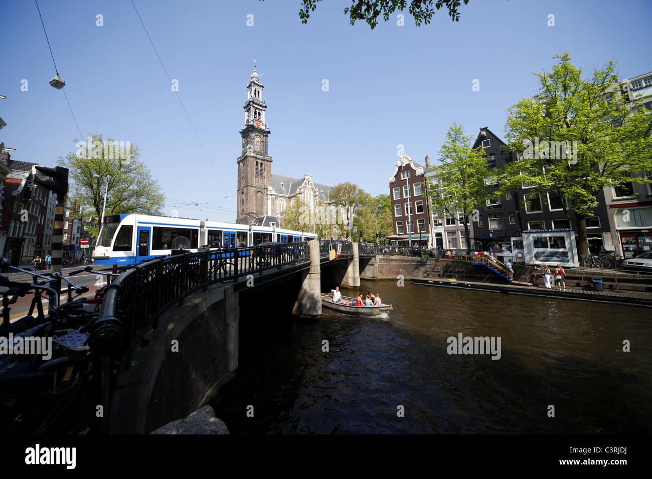 WESTER CHURCH TOWER & CANAL AMSTERDAM HOLLAND 24 April 2011 Stock Photo