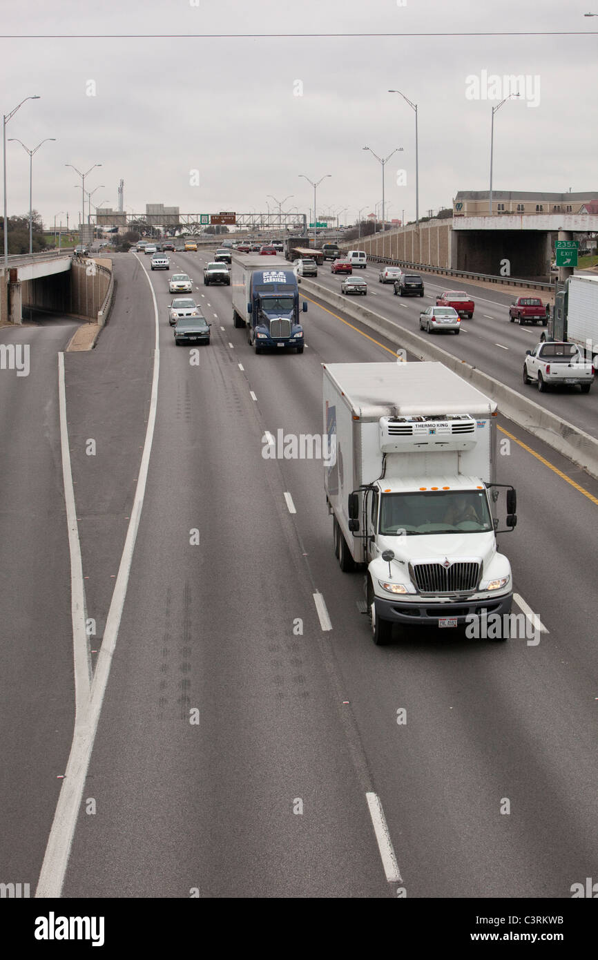 Truck and car traffic on Interstate 35 through downtown Austin Texas USA Stock Photo