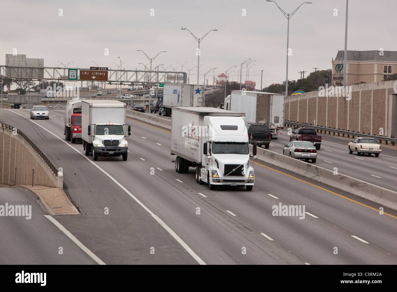 Truck and car traffic on Interstate 35 through downtown Austin Texas