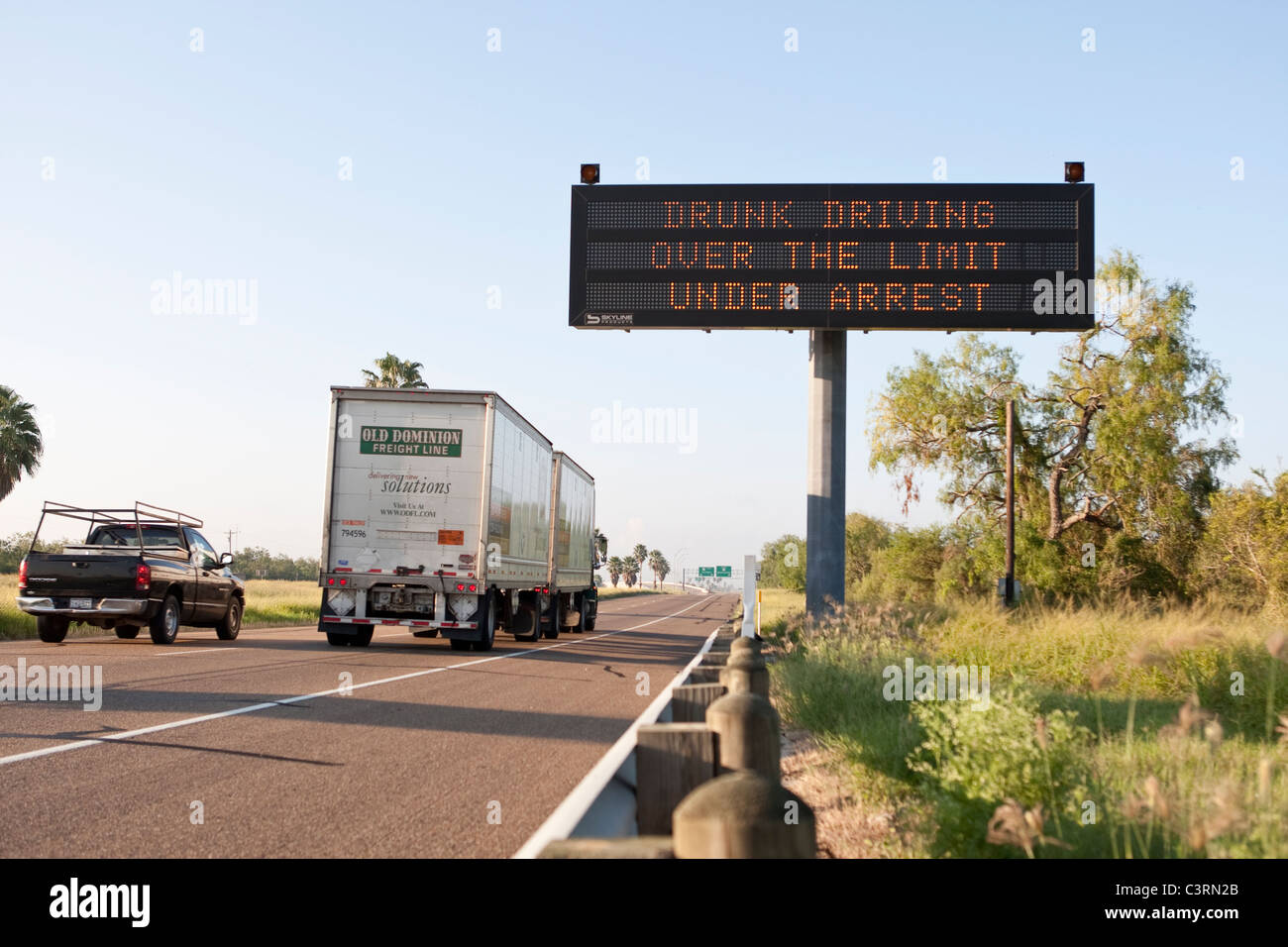 Highway message board on stretch of US Highway 77 in South Texas warns drivers against drunk driving Stock Photo