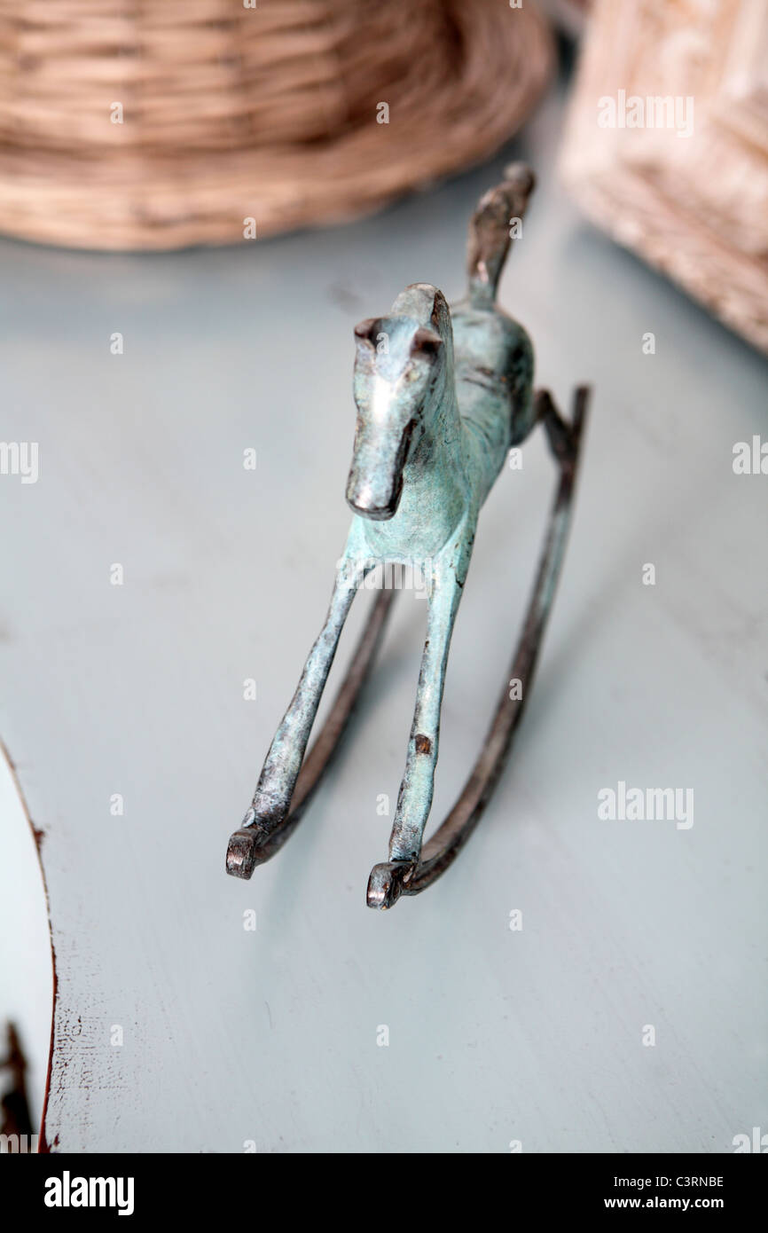 Green bronze rocking horse Stock Photo Alamy