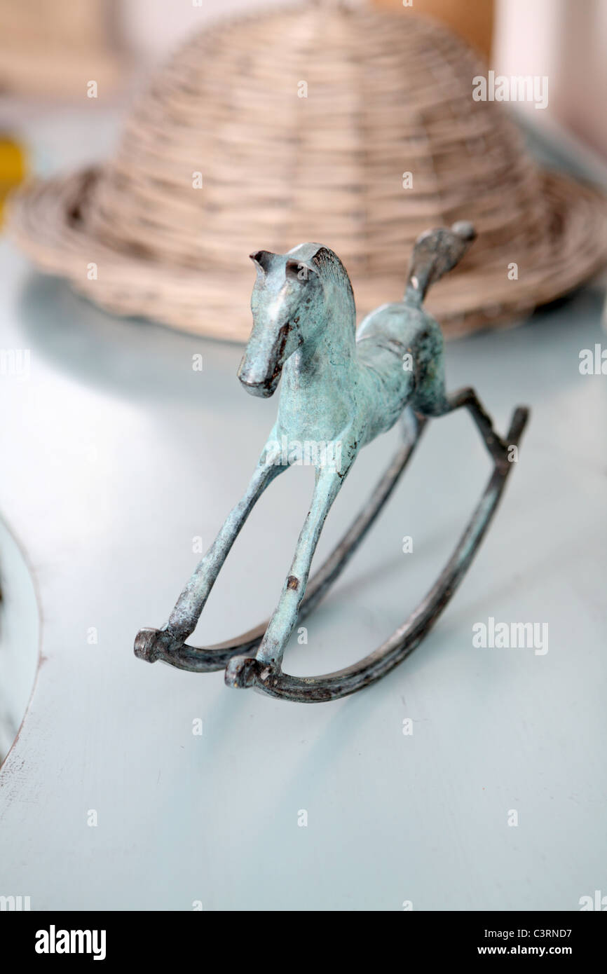 Green bronze rocking horse Stock Photo Alamy