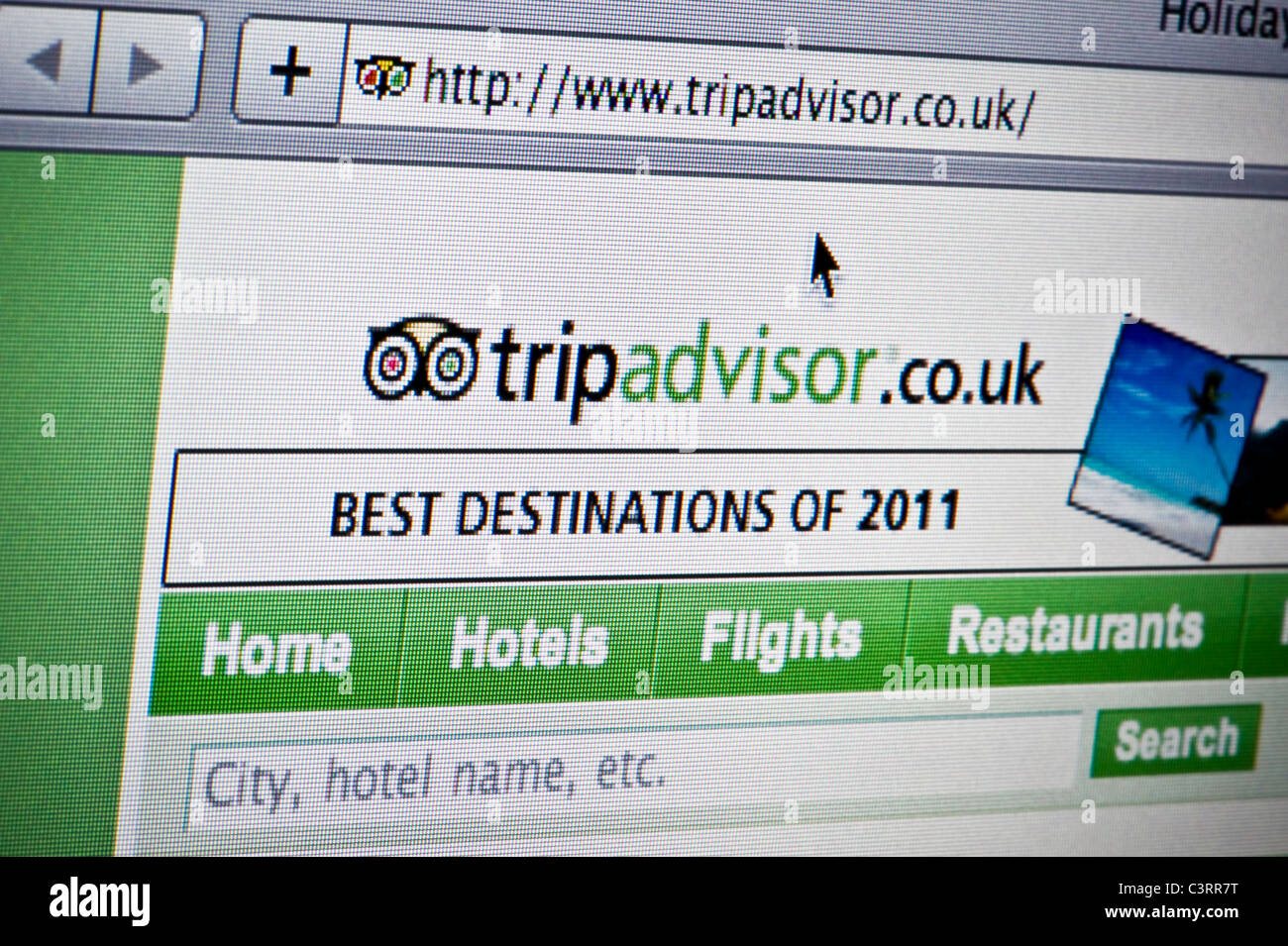 Close up of the Trip Advisor logo as seen on its website. (Editorial use only: print, TV, e-book and editorial website). Stock Photo