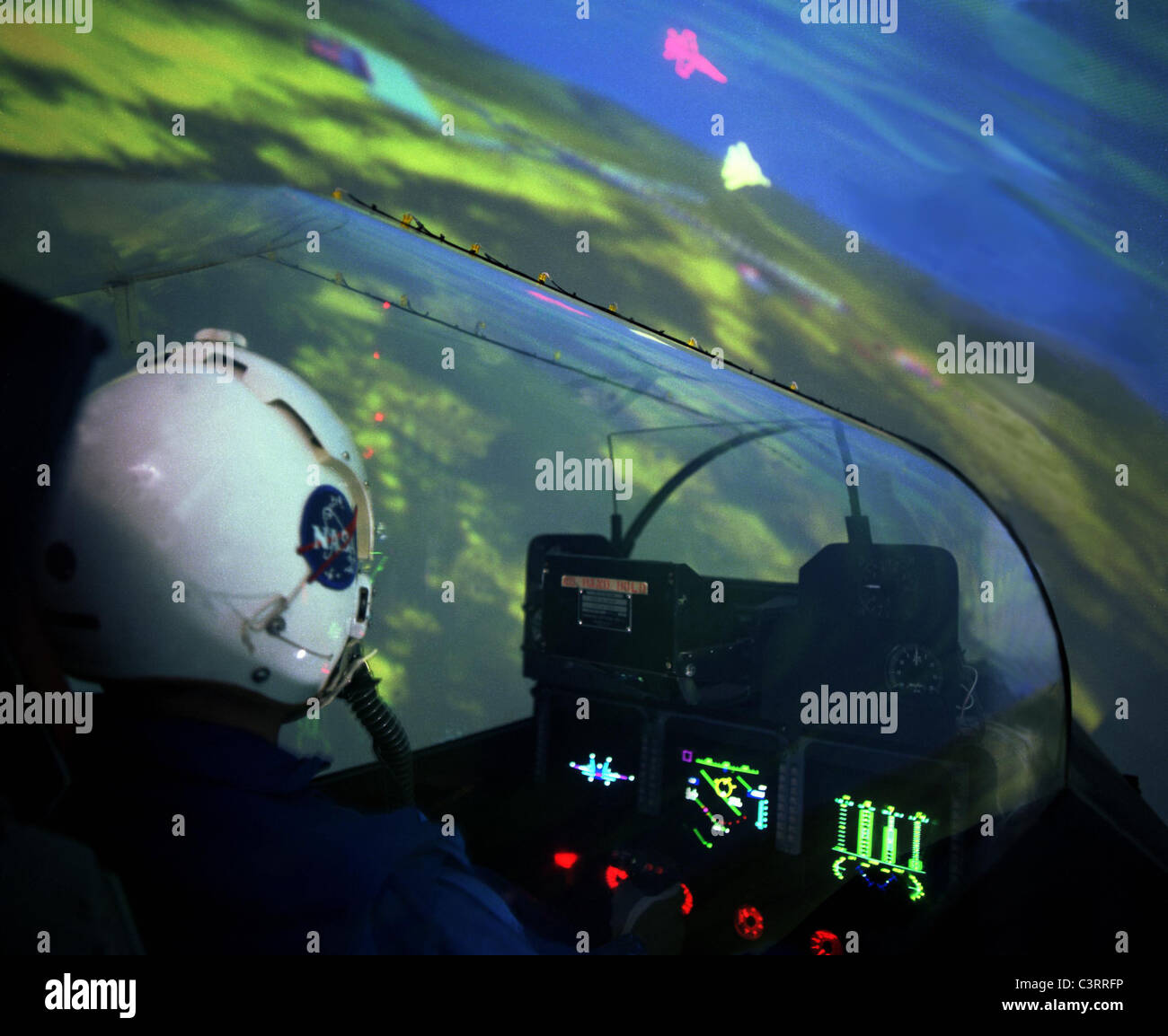 DMS Simulator. Pilot in training simulator in 2 vs 1 flight simulation. Stock Photo
