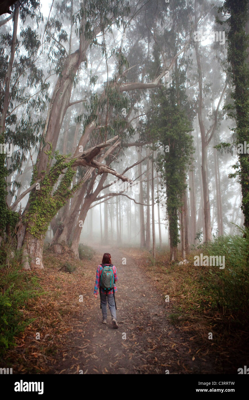Asian calm woman alone walking hi-res stock photography and images - Alamy