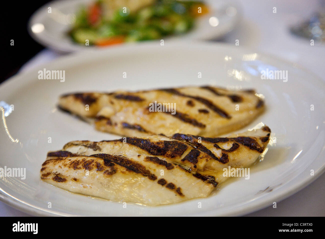 Grilled fish at Cipriani Dolci, inside Grand Central Station, New York City Stock Photo