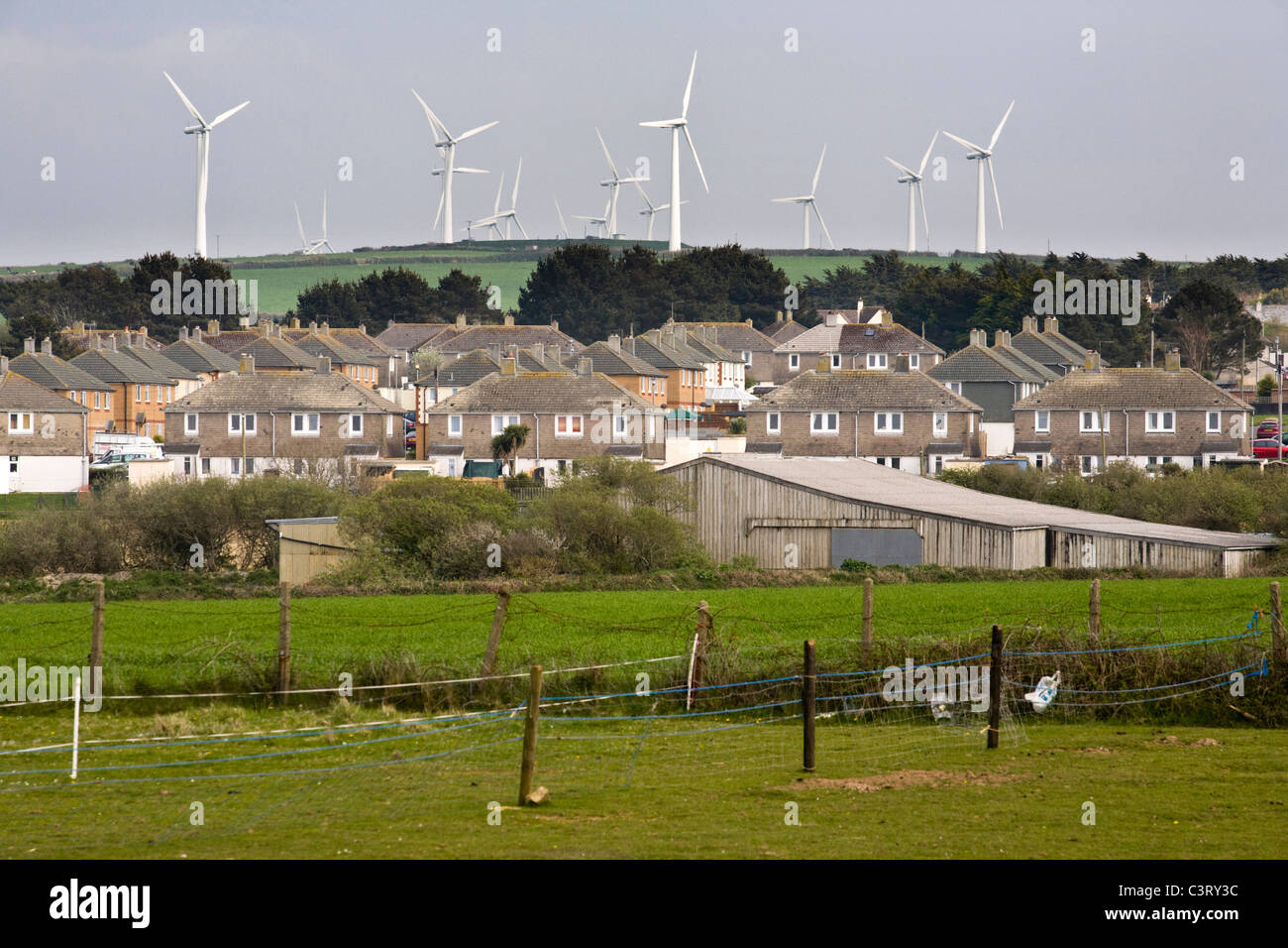 Wind farm near housing at Bear's Down, St Eval, near Padstow, North