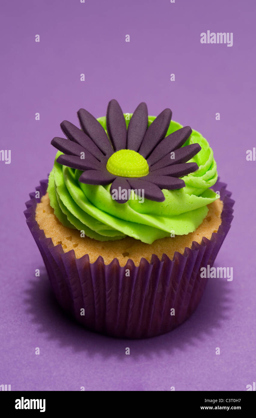 purple and green floral cup cake design Stock Photo