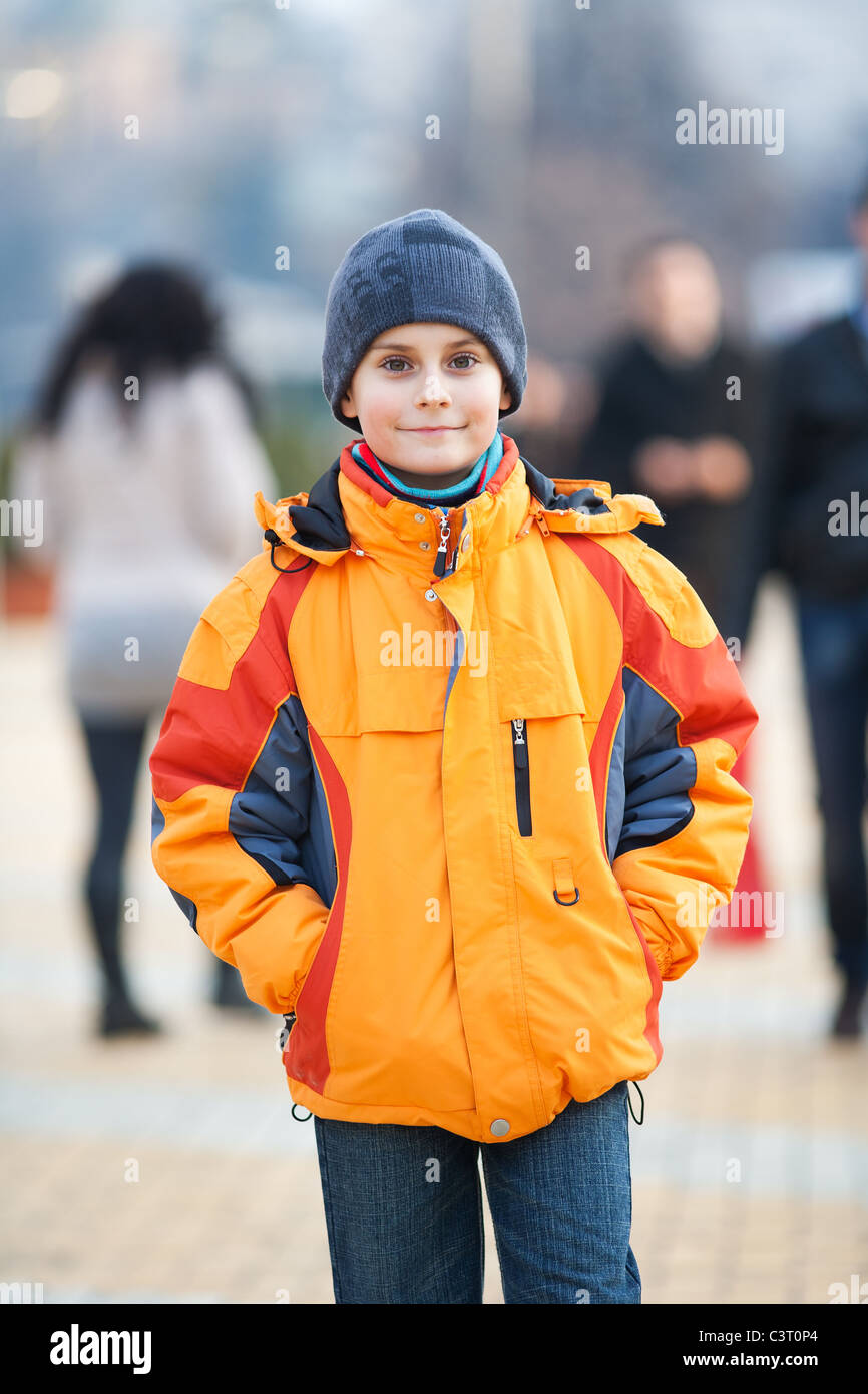 Candid shot of a beautiful boy in an urban environment Stock Photo - Alamy