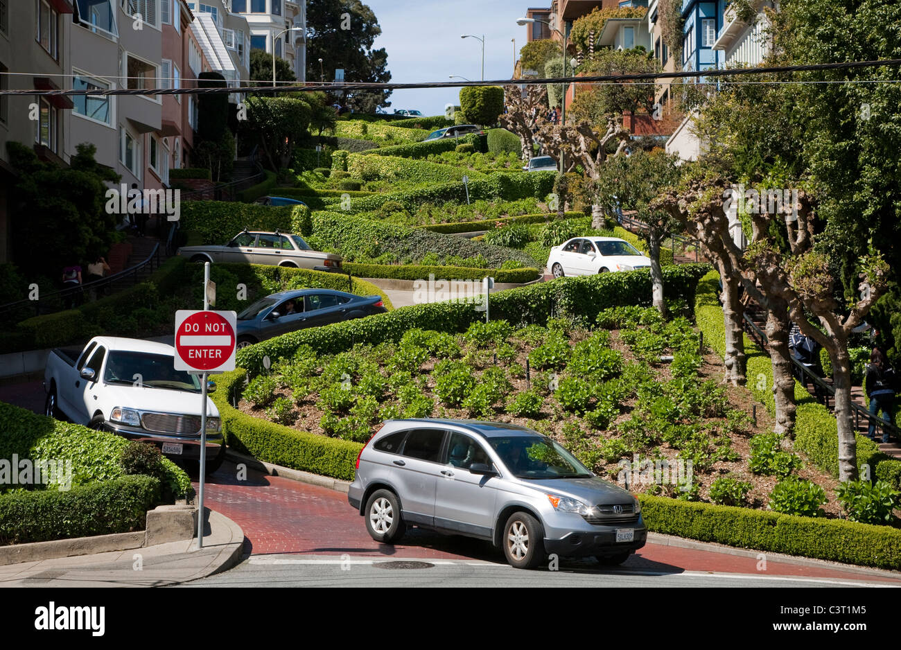 Cars driving down tight twisting hairpin bends of Lombard Street, San