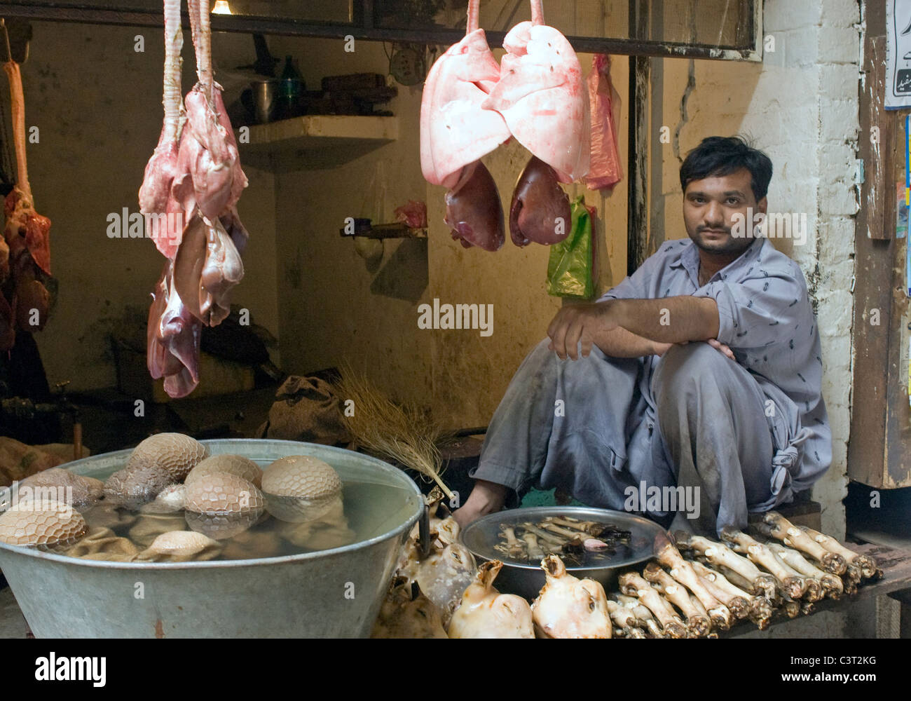 A man sells animal parts in the Old CIty. Stock Photo