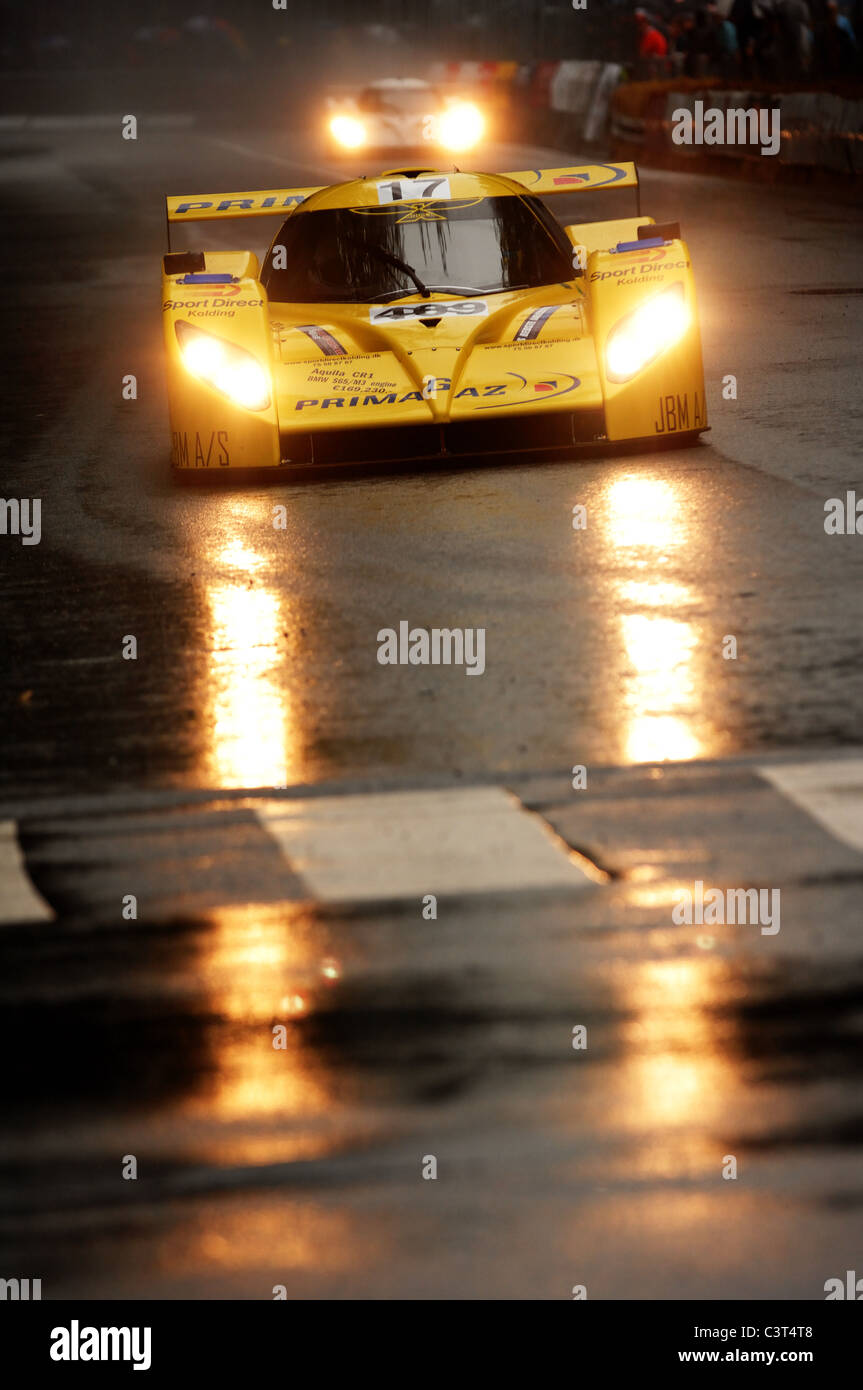 Car race street circuit Copenhagen Denmark.Cars approaching on a wet