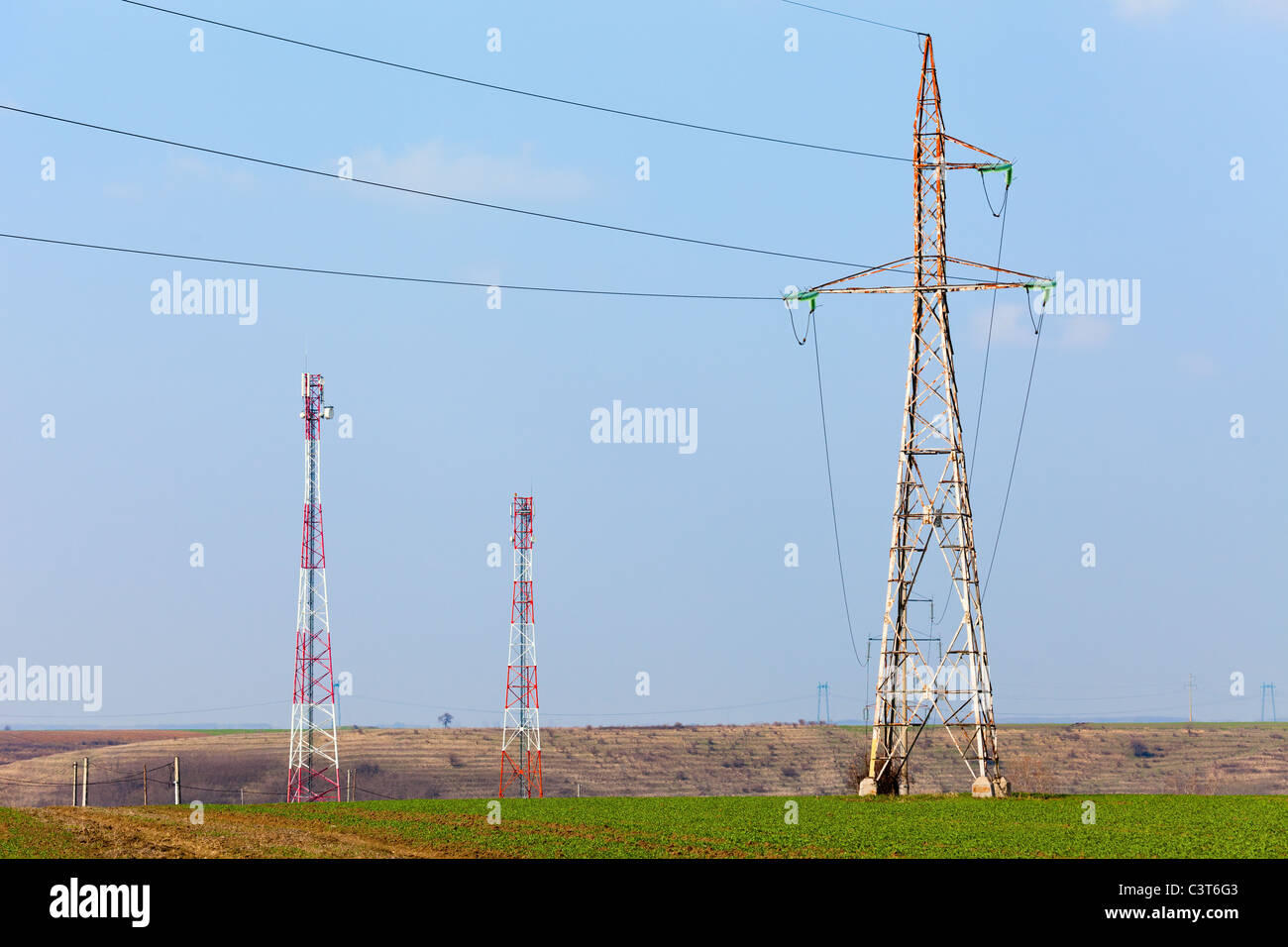 Landscape with big power lines against the blue sky Stock Photo - Alamy