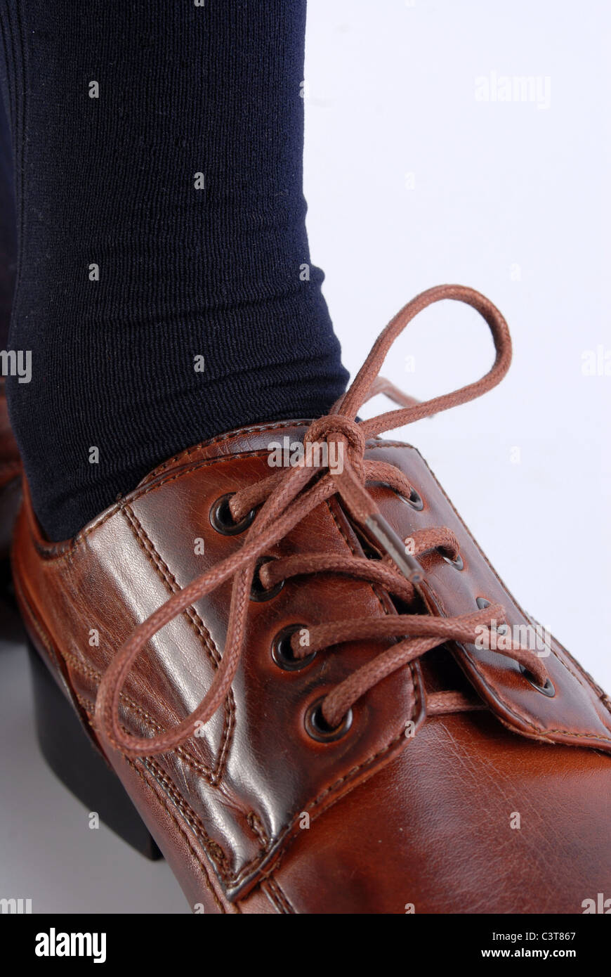 Close-up of a brown polished male shoe. Stock Photo