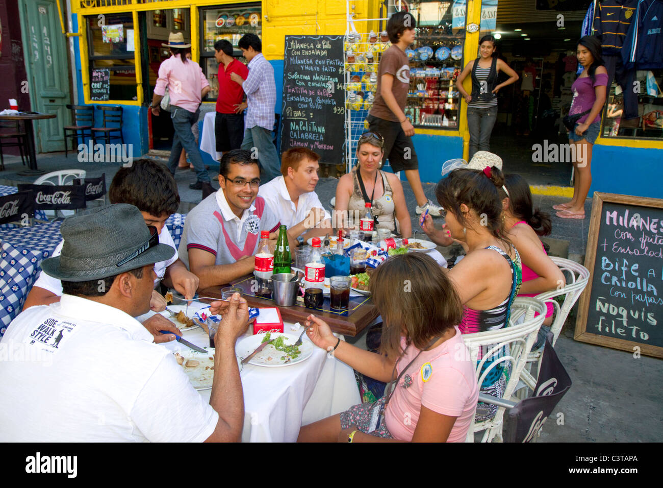 People dine at an outdoor cafe in the La Boca barrio of Buenos Aires, Argentina. Stock Photo