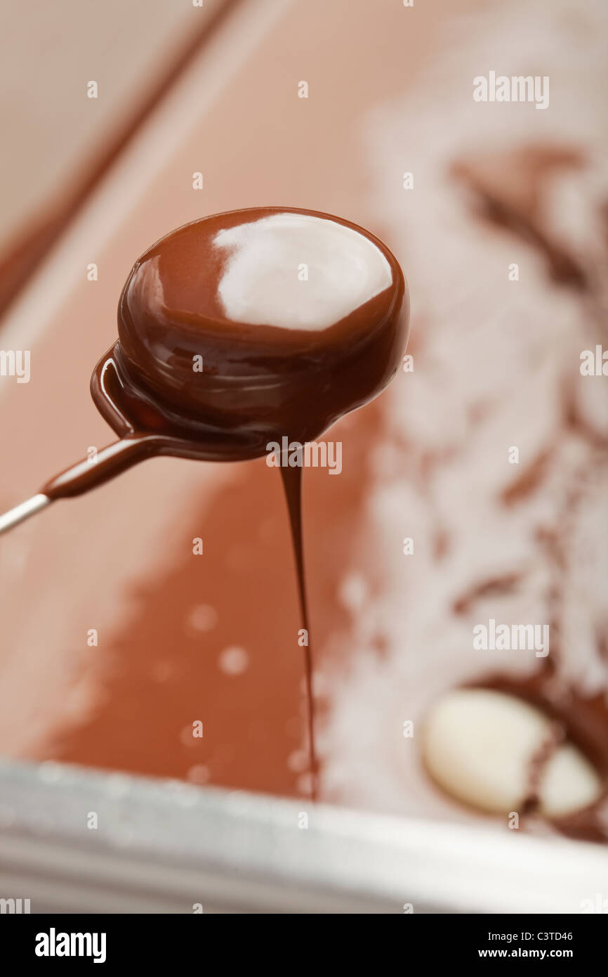 Candy dripping chocolate Stock Photo Alamy