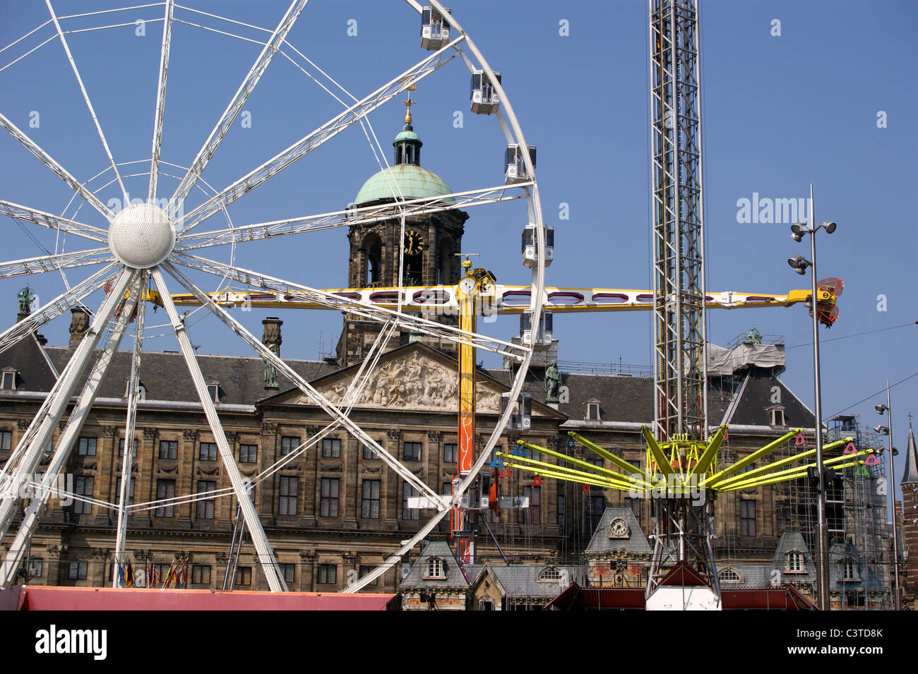 Ferris wheel and Easter fair on the Dam in front of the Royal Palace
