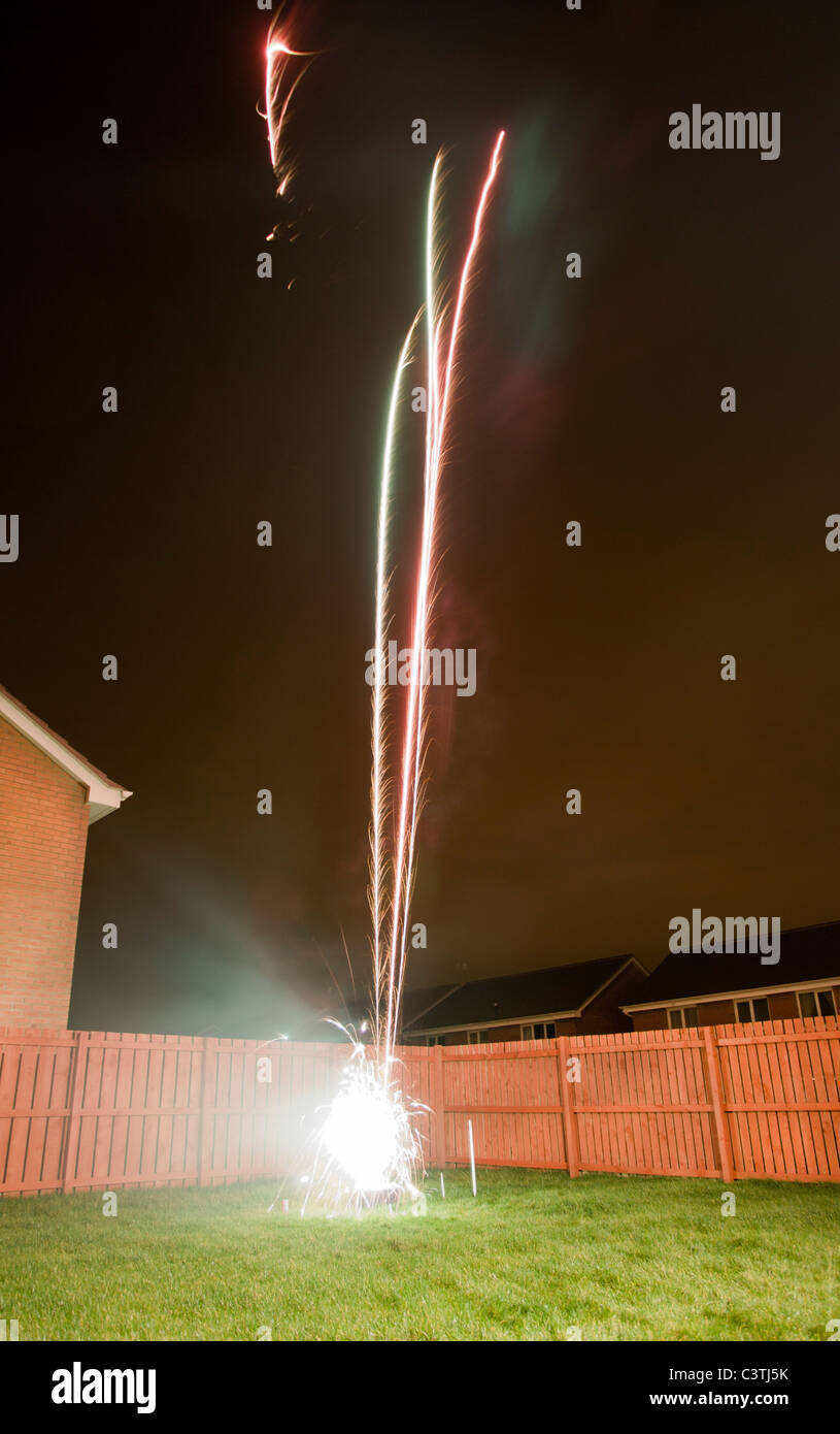 Fireworks in a back garden Stock Photo Alamy