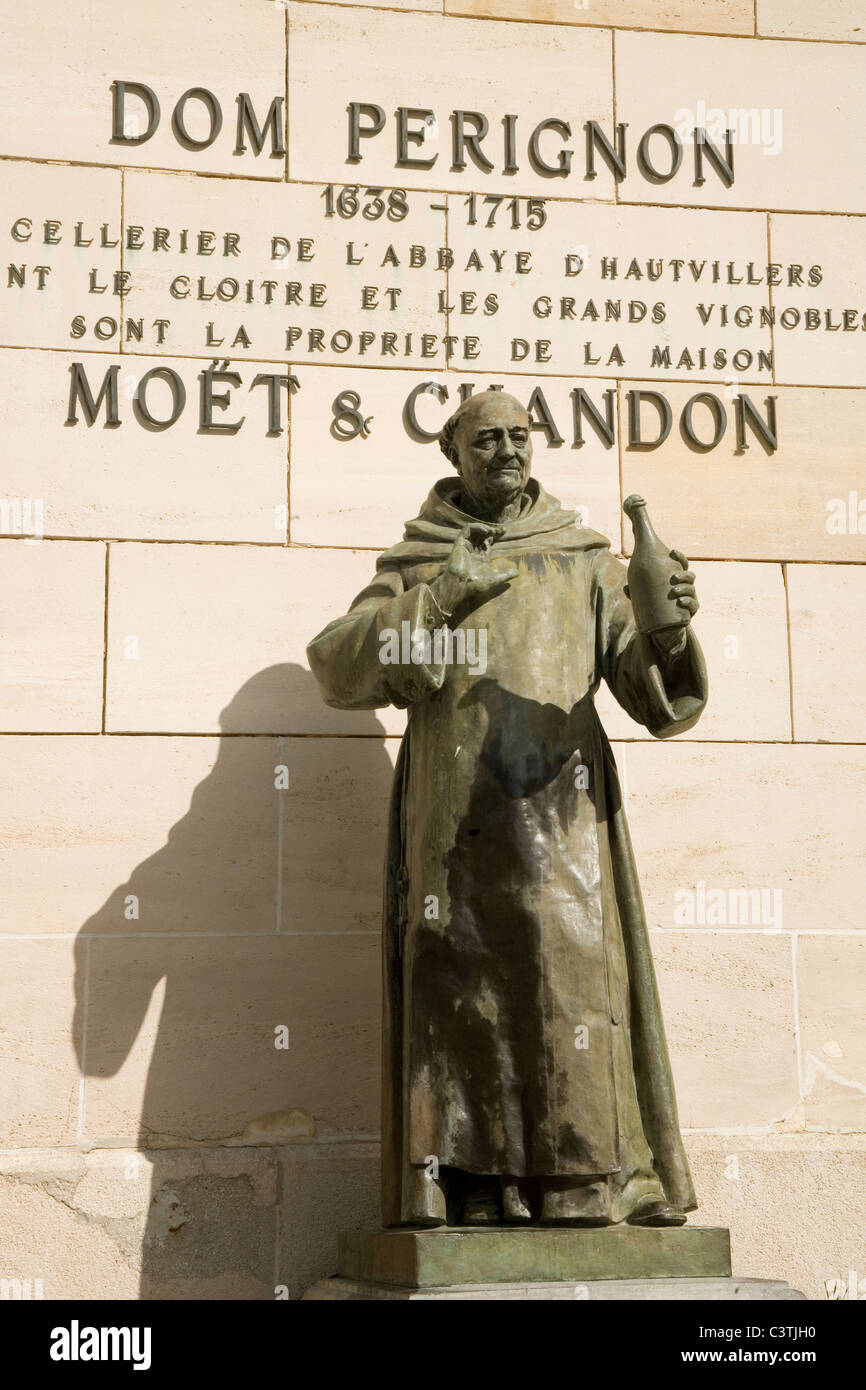 A statue of the monk Dom Perignon the inventor of champagne holding a  bottle in the courtyard of Moet Chandon LVMH group in Epernay France Stock  Photo - Alamy