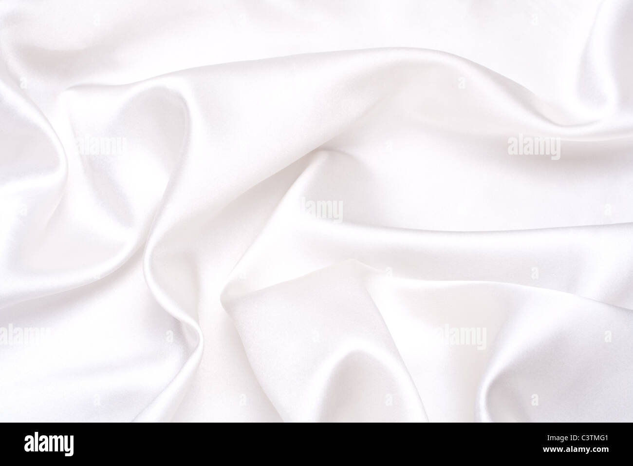 white satin fabric as a background Stock Photo - Alamy