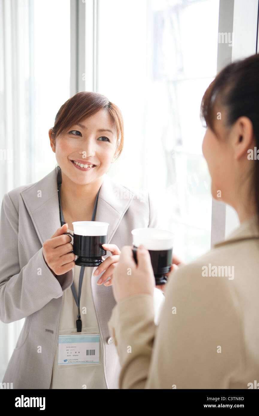 Businesswomen Having Coffee Break Stock Photo Alamy