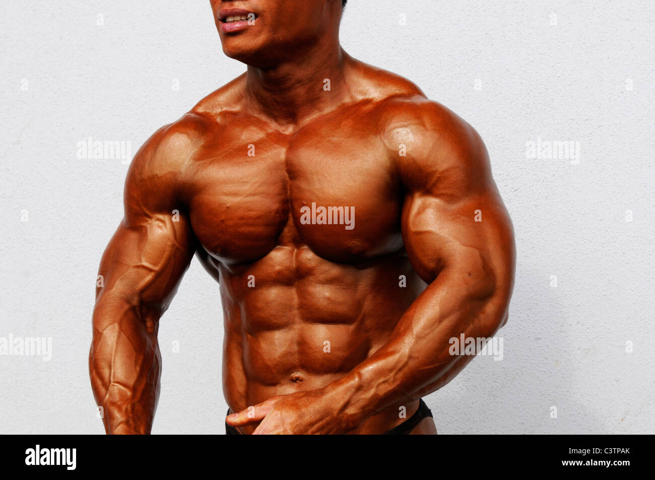 Bodybuilders during competition , Bangkok, Thailand Stock Photo