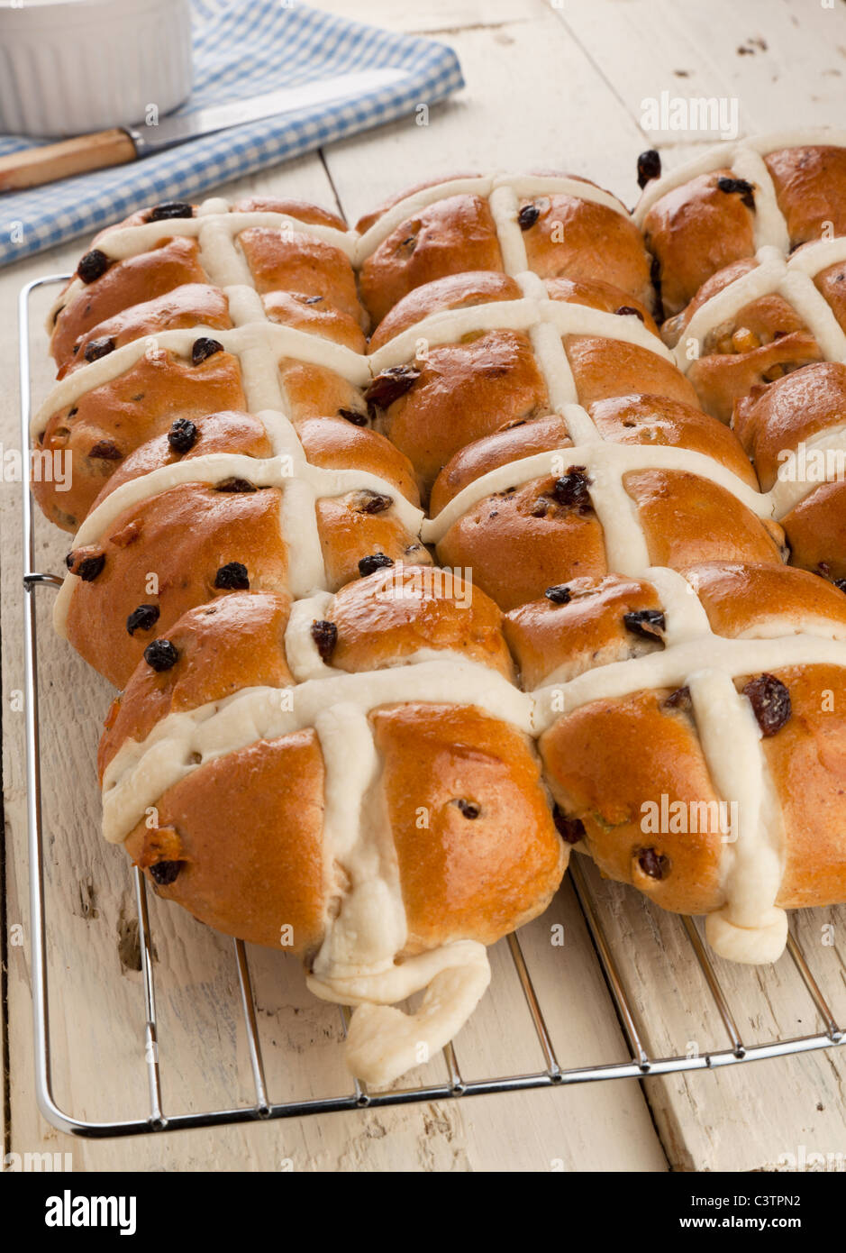 Hot cross buns on a cooling tray Stock Photo
