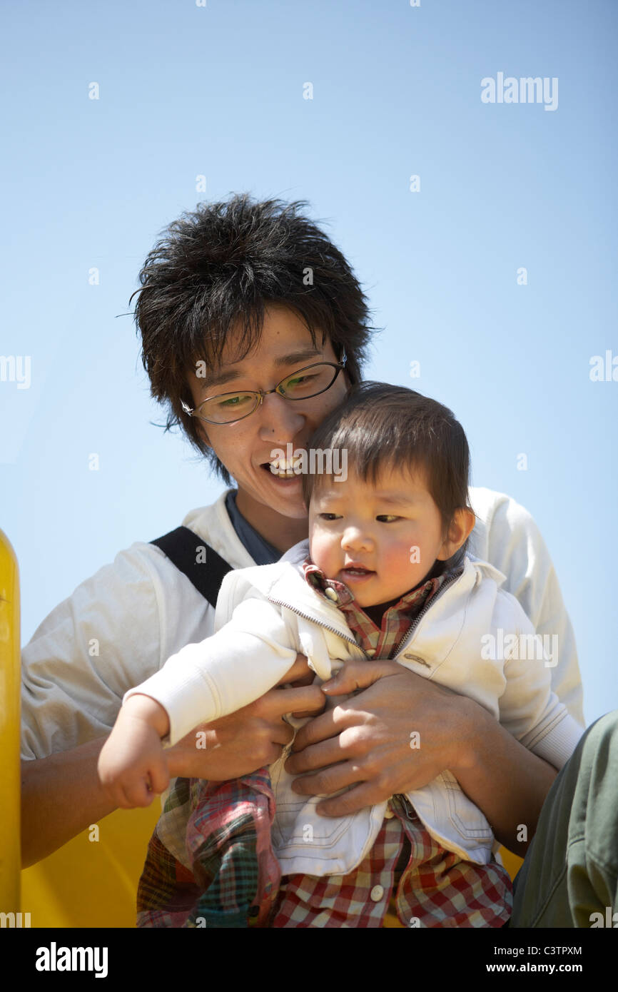 Father and Son in Playground Stock Photo - Alamy