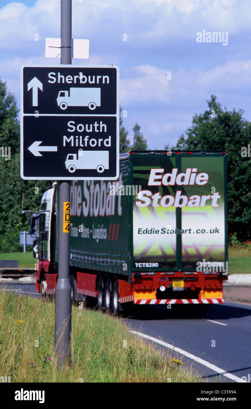 roadsign directing lorrys to turn left or go straight ahead for prefered route Yorkshire UK Stock Photo