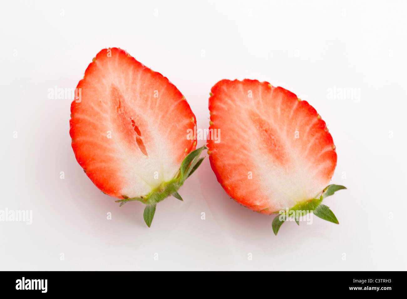 Strawberry cut in half hires stock photography and images Alamy
