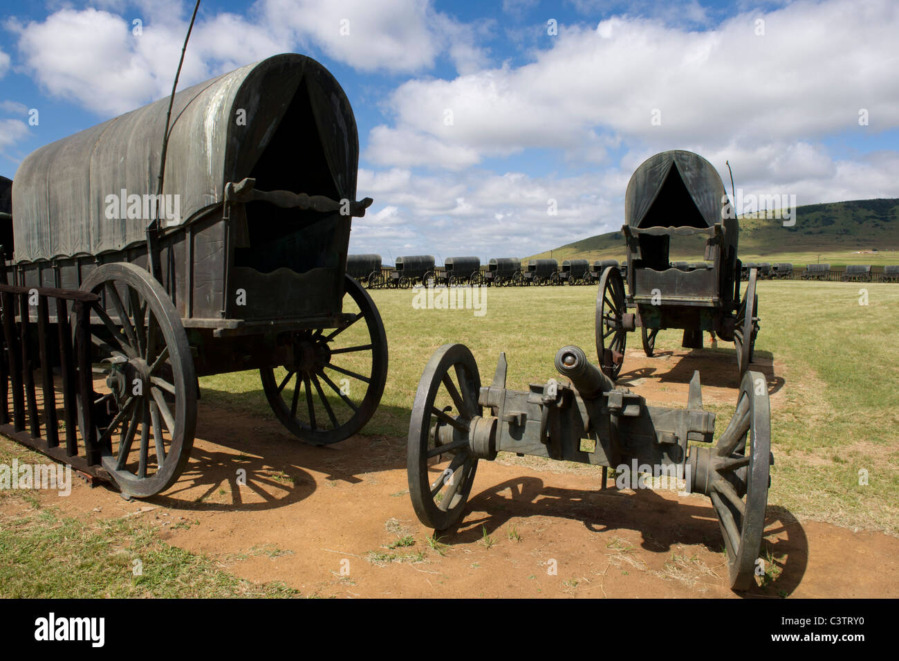Laager with bronze replicas of ox-wagons used by Voortrekkers at the Battle of Blood River, Blood River museum, South Africa Stock Photo