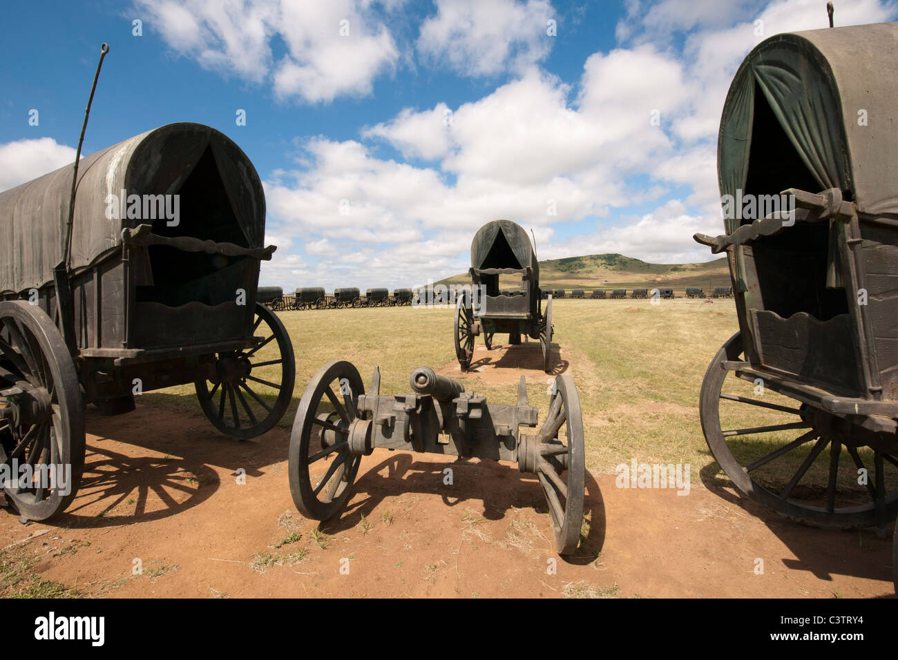 Laager with bronze replicas of ox-wagons used by Voortrekkers at the Battle of Blood River, Blood River museum, South Africa Stock Photo
