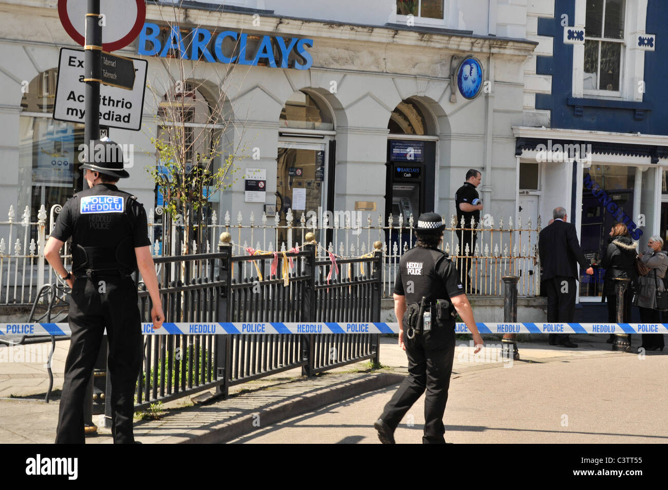 Police in attendance after a Bank robbery at a branch of Barclays bank, Machynlleth Powys Wales UK - May 19 2011 Stock Photo