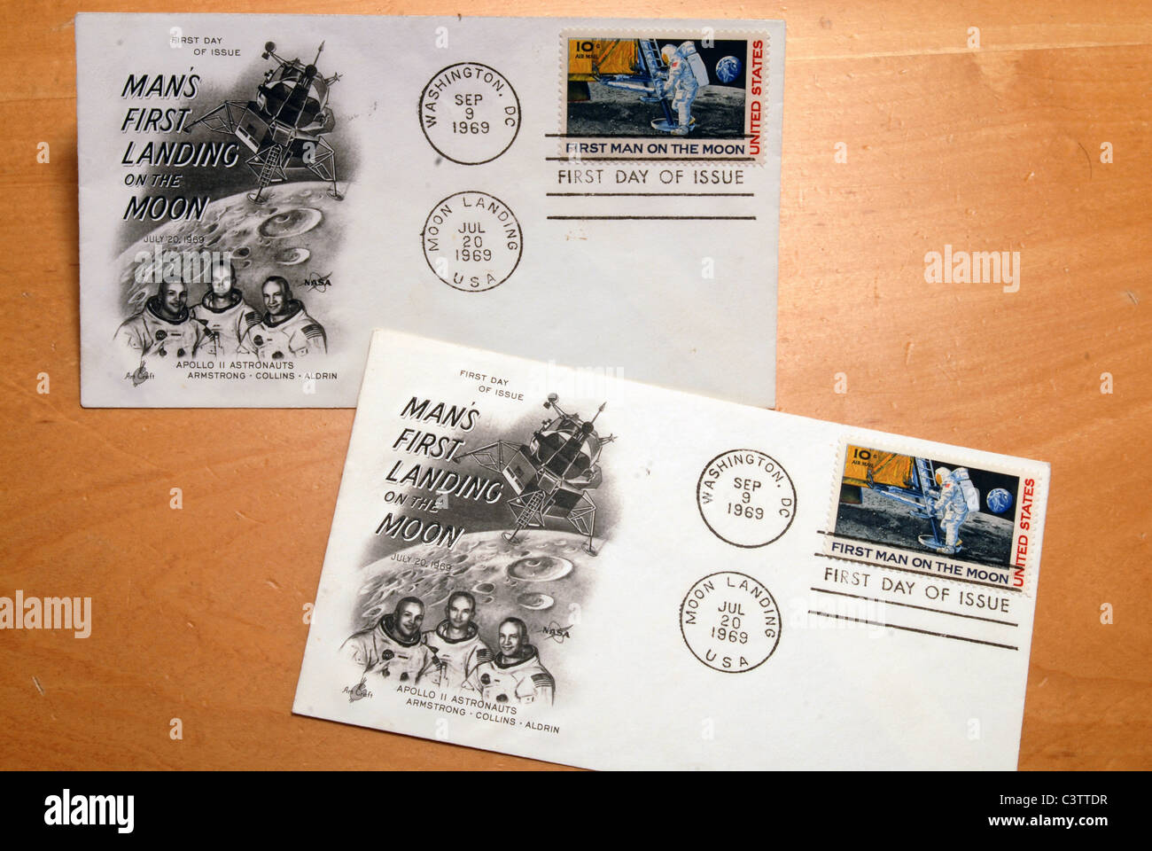Two postcards with the vintage stamp commemorating the first man on the moon Stock Photo