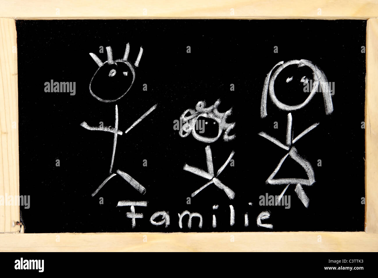 a chalkboard with the drawing of a family Stock Photo