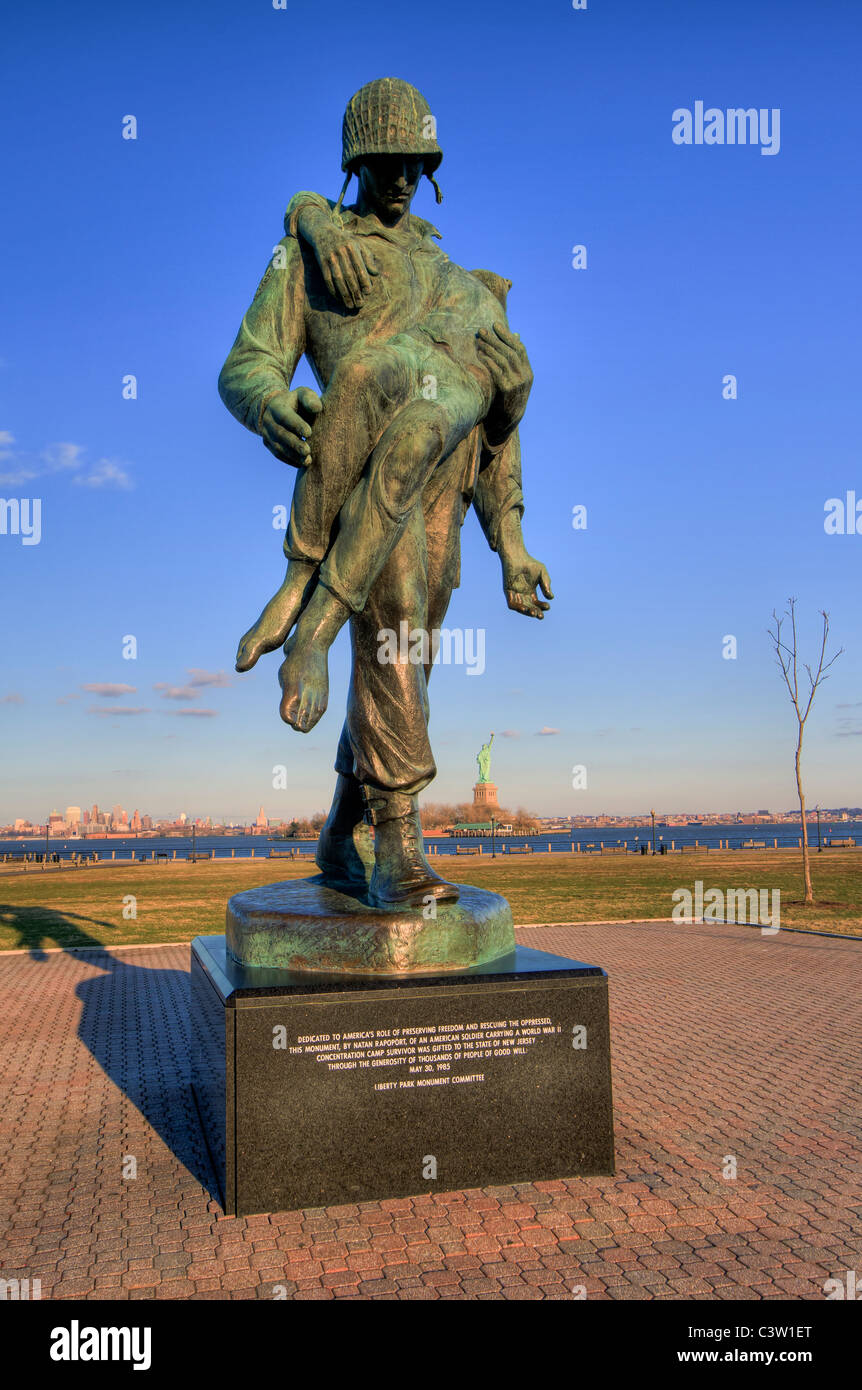 The sculpture 'Liberation' at Liberty State Park depicts an American soldier carrying a concentration camp survivor Stock Photo