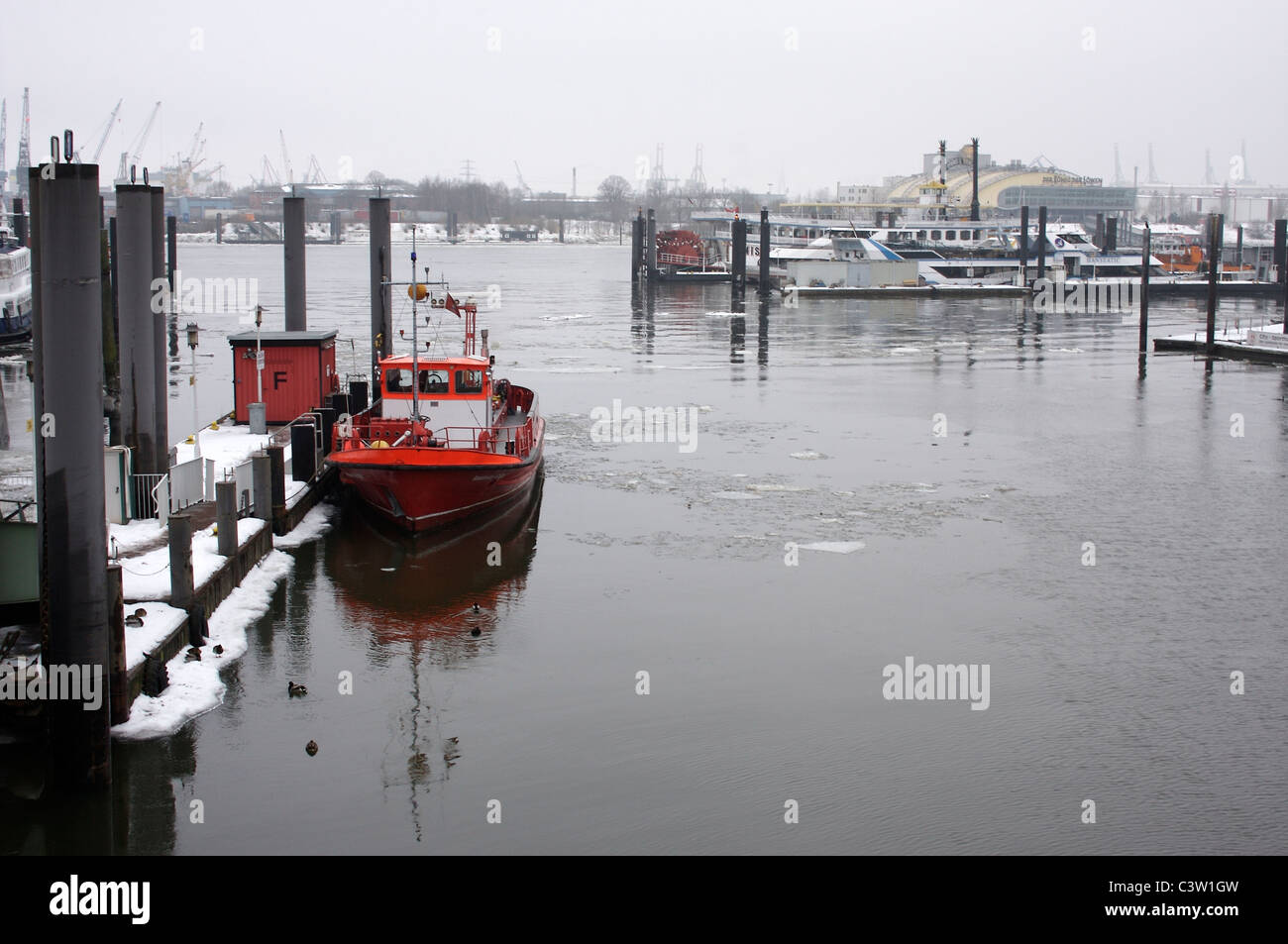 Tugboat tied to a marina in the Binnenhafen harbour in Hamburg, Germany Stock Photo