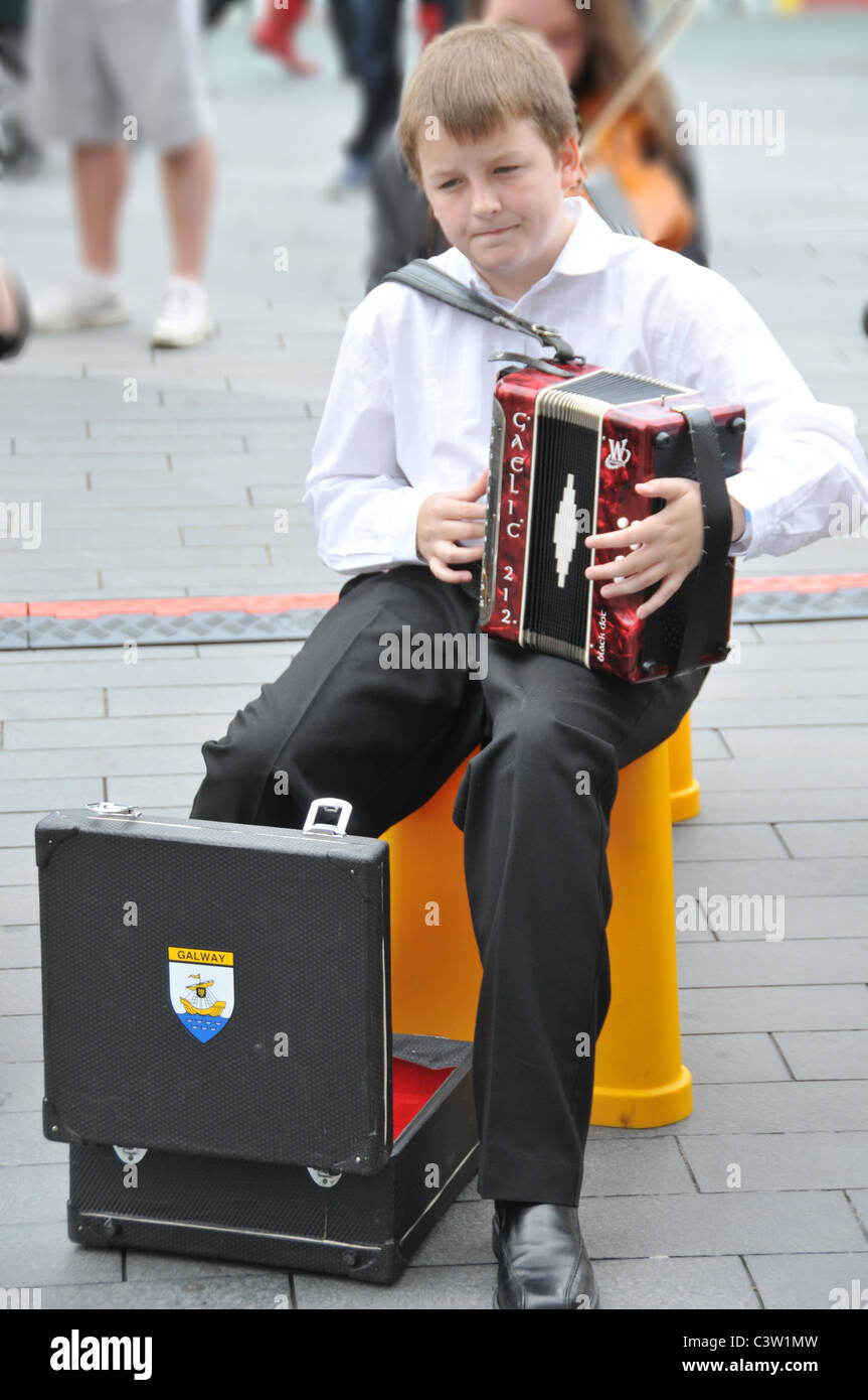 Irish boy playing accordion accordionist Ireland Irish musical