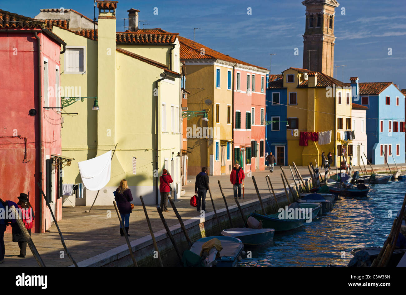 Colorful buildings by canal in Murano Stock Photo