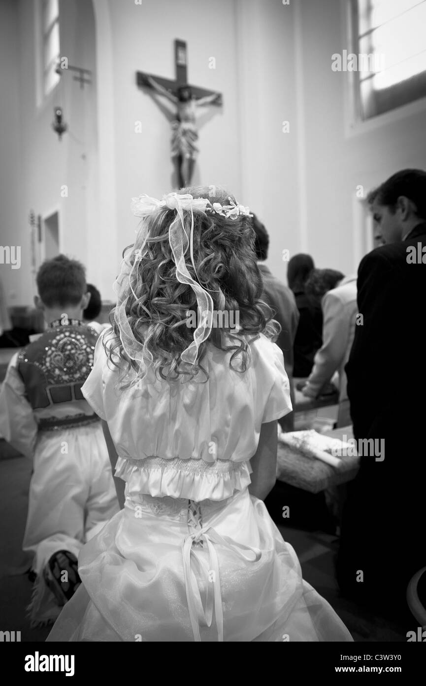 Young girl on Holy Communion in Europe church Stock Photo - Alamy