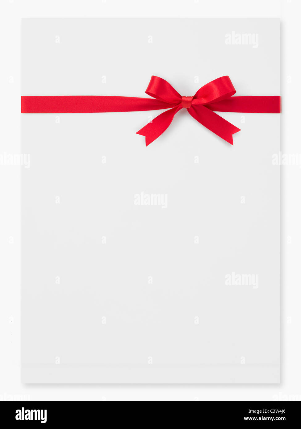 Red ribbon on a box Stock Photo