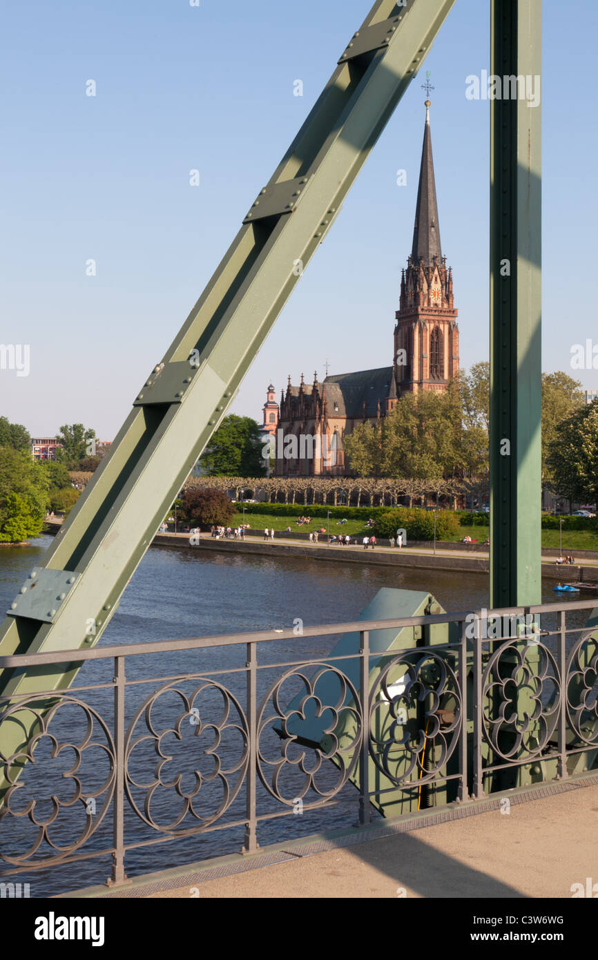 The Dreikönigskiche in the Frankfurt suburb of Sachsenhausen as seen through the historical Eiserner Steg Stock Photo