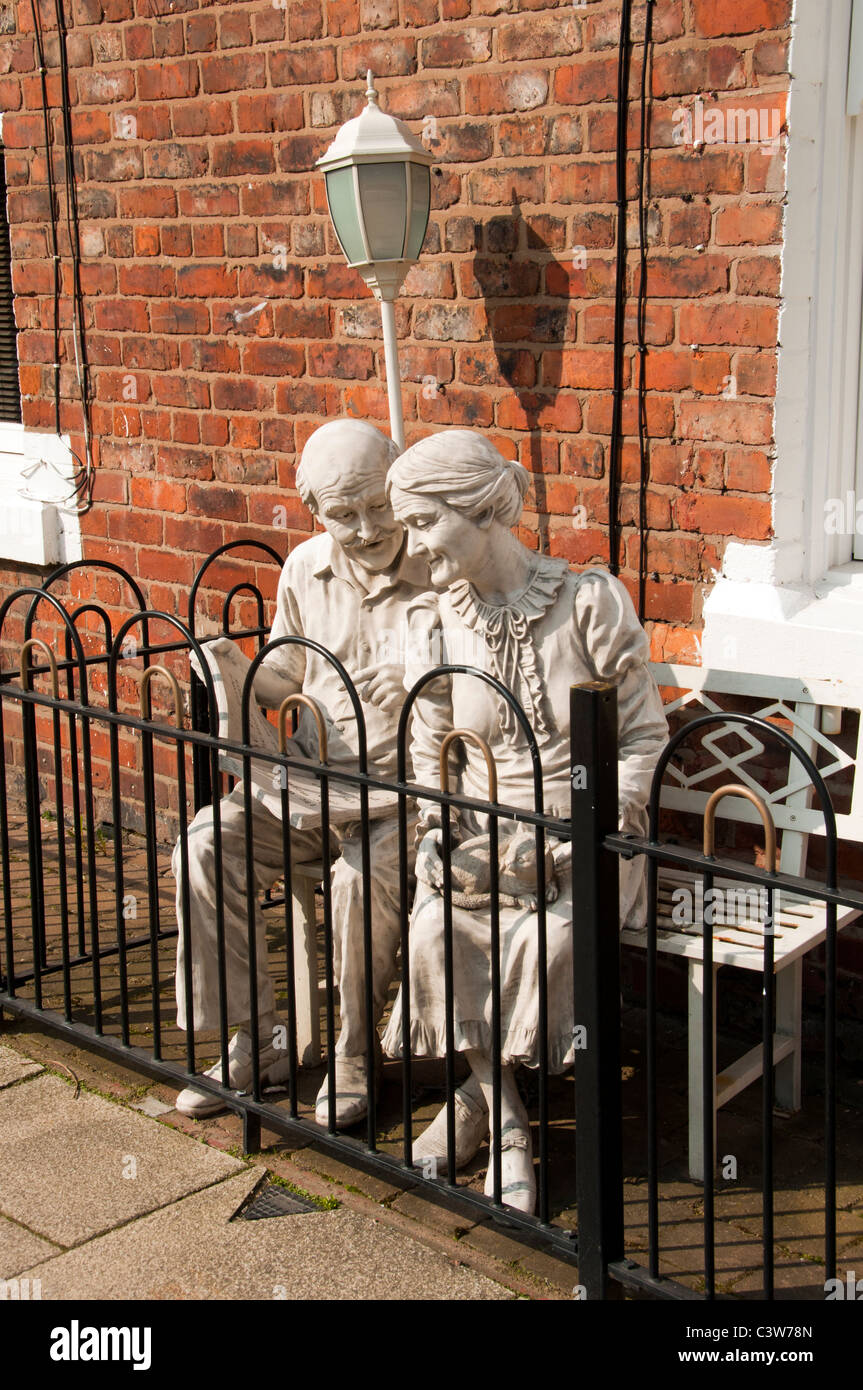 Statue of an elderly couple on Anita Street, Ancoats Urban Village, Northern Quarter, Manchester, England, UK. Stock Photo
