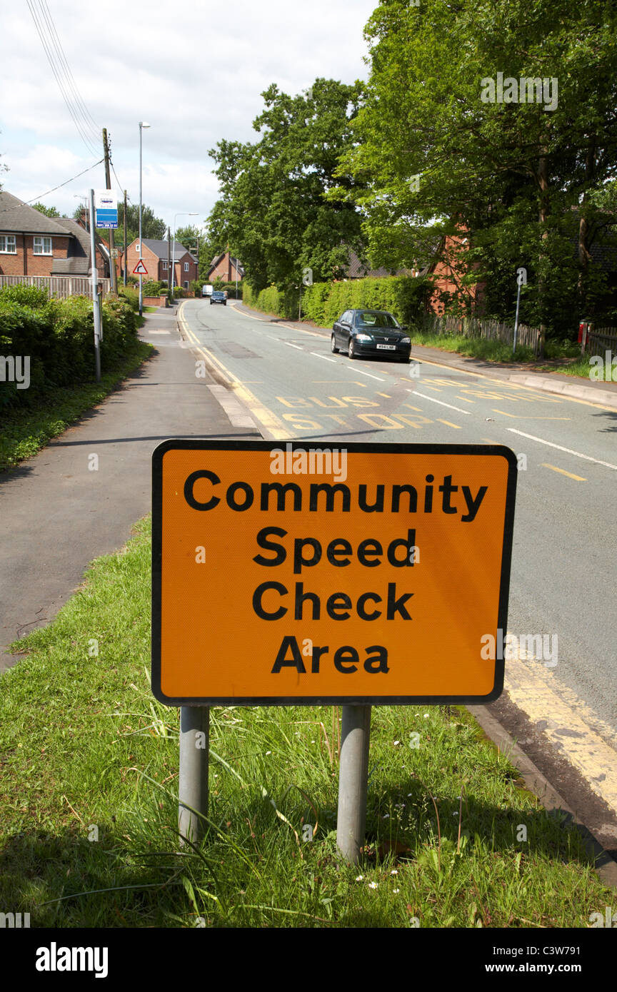 Community speed check area sign in Cheshire village UK Stock Photo