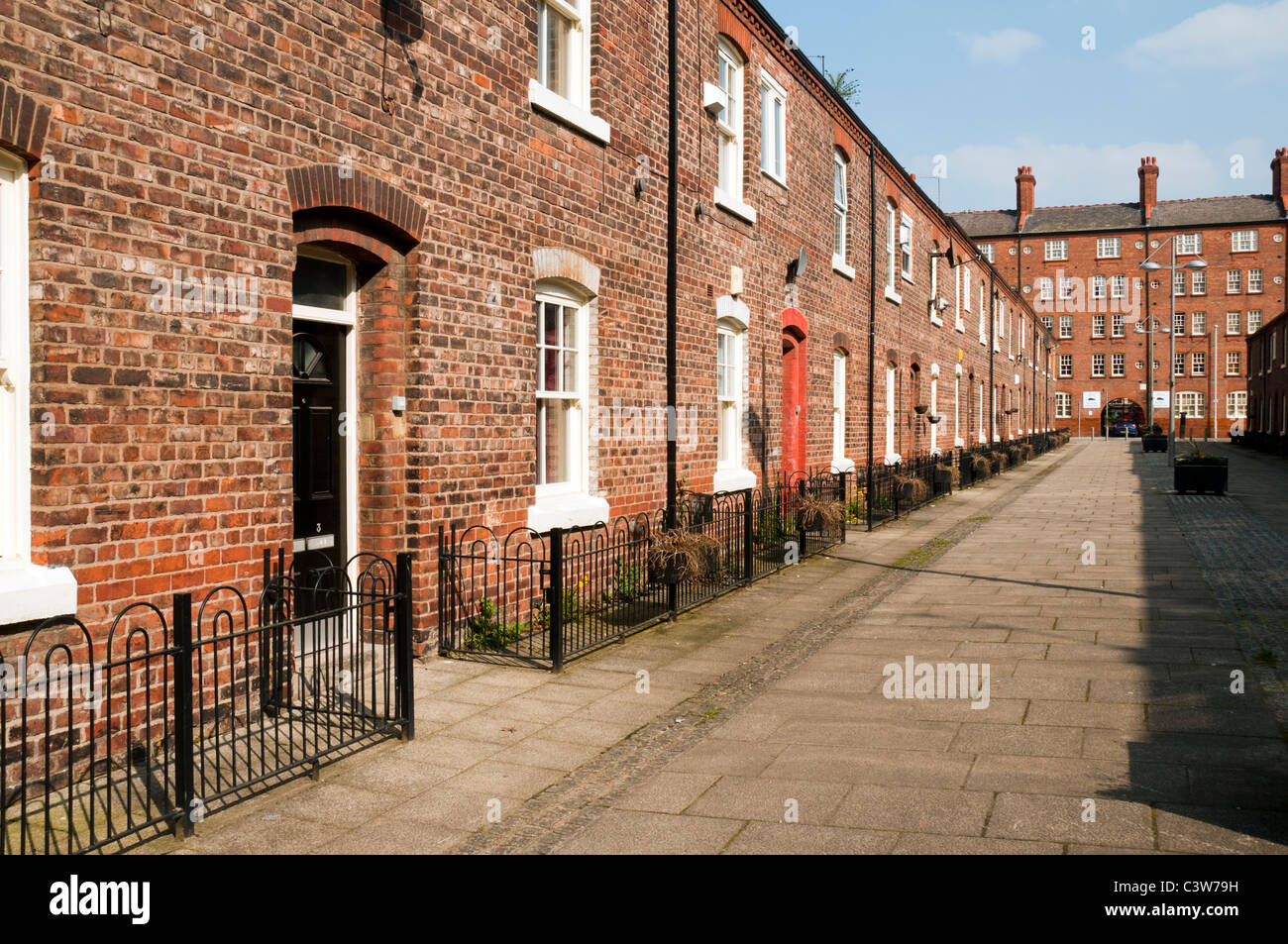 Restored late 19th century terraced houses, Anita Street, Ancoats Urban Village, Northern Quarter, Manchester, England, UK. Stock Photo