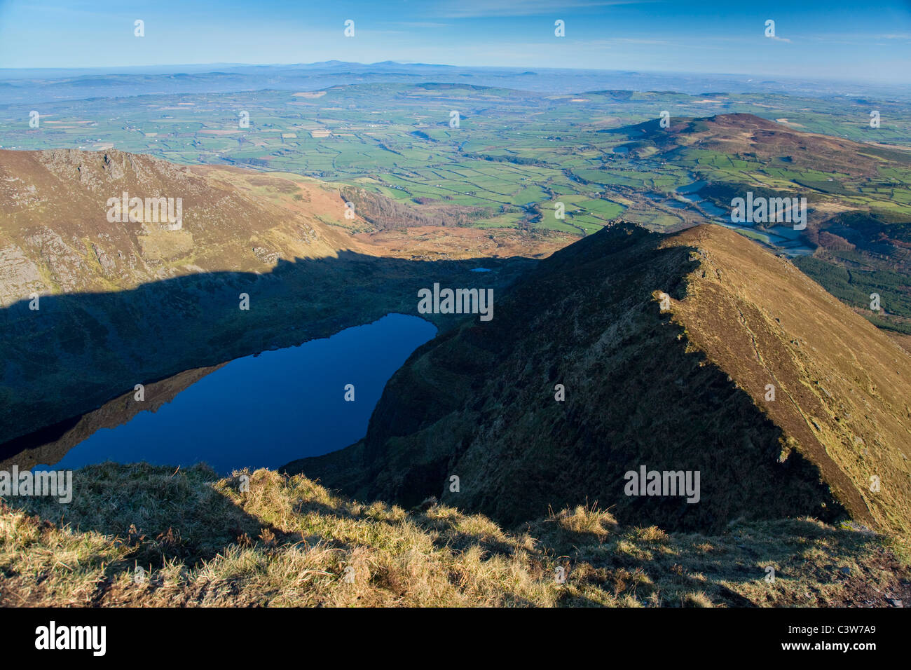 View over Coumshingaun Lough from the ridge above, Comeragh Mountains, County Waterford, Ireland. Stock Photo