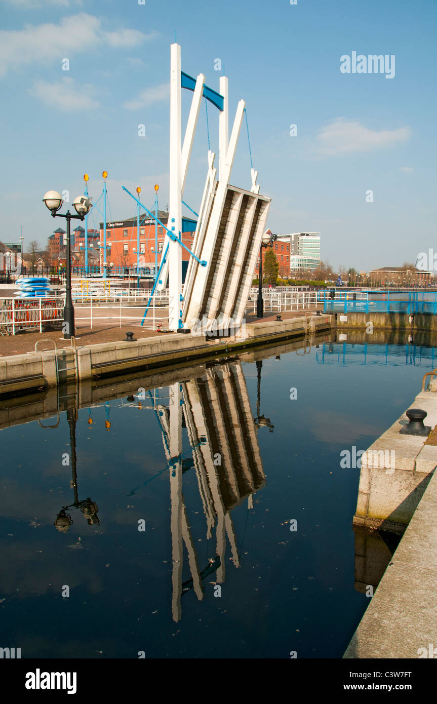 One half of the double leaf bascule bridge at Welland Lock, Salford Quays, Manchester, England, UK.  Opened for maintenance. Stock Photo