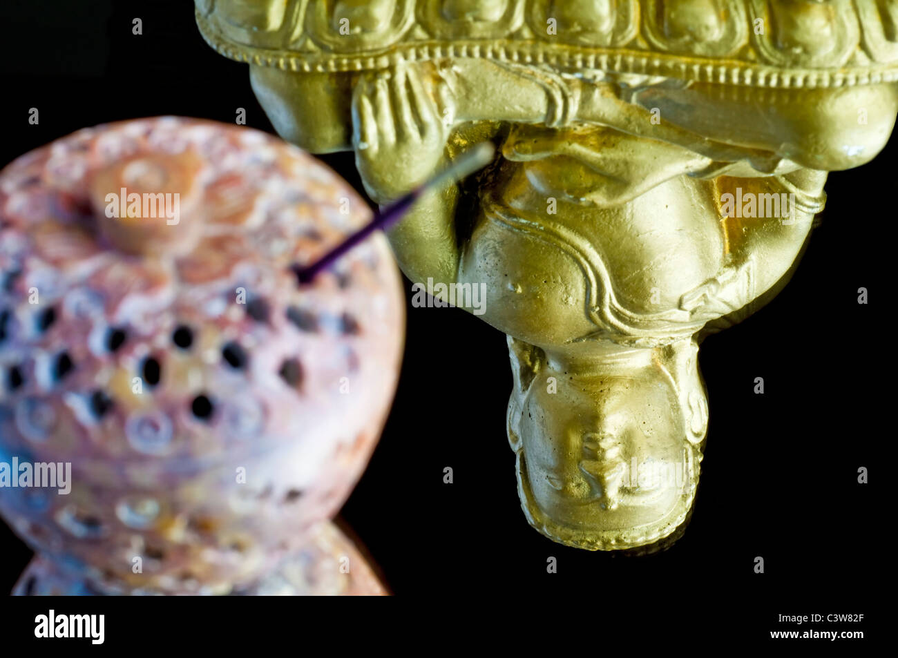 Buddha in a mirror Stock Photo Alamy