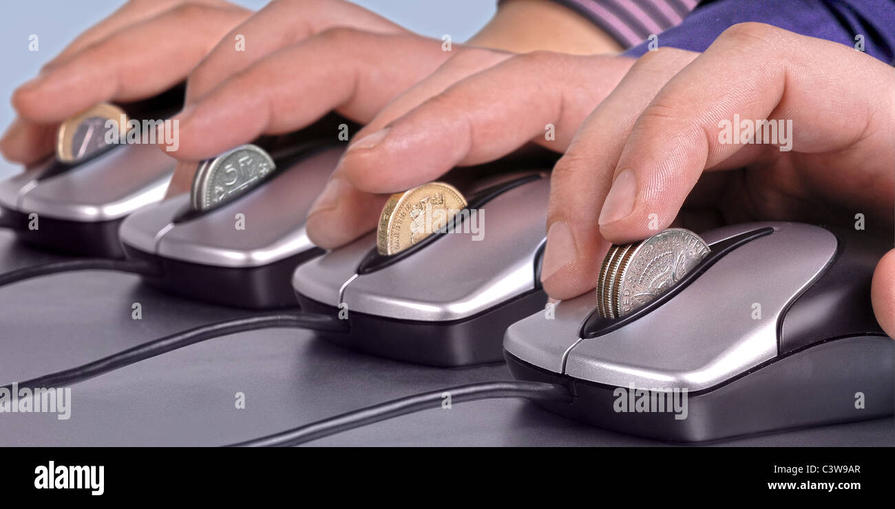 Photographic illustration by MEESON.  A row of computer mice, with the wheel replaced by different currencies. Stock Photo